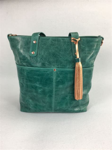 teal leather tote bag.